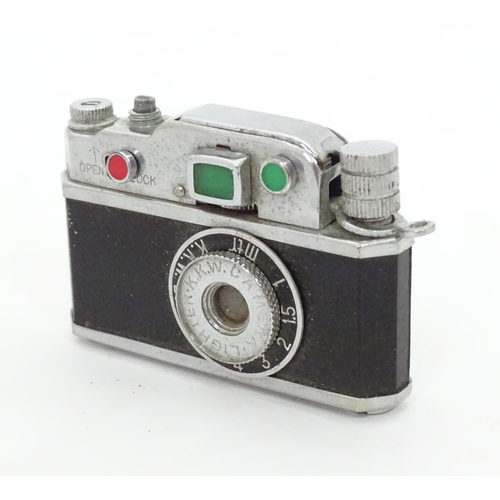 456 - A novelty lighter formed as a camera. Approx. 2 1/2