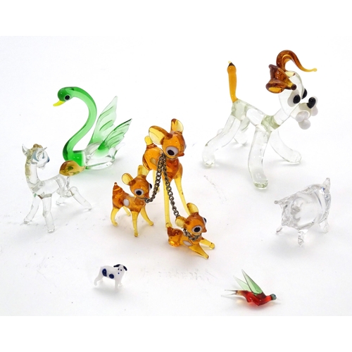 460 - A quality of assorted small glass animal figures modelled as dog, pig, swan, bird, deer etc. In the ... 