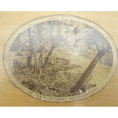 462 - A 19thC Mauchline ware box decorated with oval landscape views of the river Wharf, Bolton Woods, Yor... 