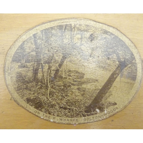 462 - A 19thC Mauchline ware box decorated with oval landscape views of the river Wharf, Bolton Woods, Yor... 