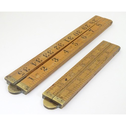 463 - Vintage Tools: Two boxwood and brass mounted surveyor's rules, one by John Rabone & Sons, Birmingham... 