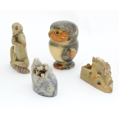 464 - Four various soapstone items , one formed as an owl, one a monkey and two other Oriental examples. T... 