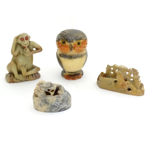 464 - Four various soapstone items , one formed as an owl, one a monkey and two other Oriental examples. T... 