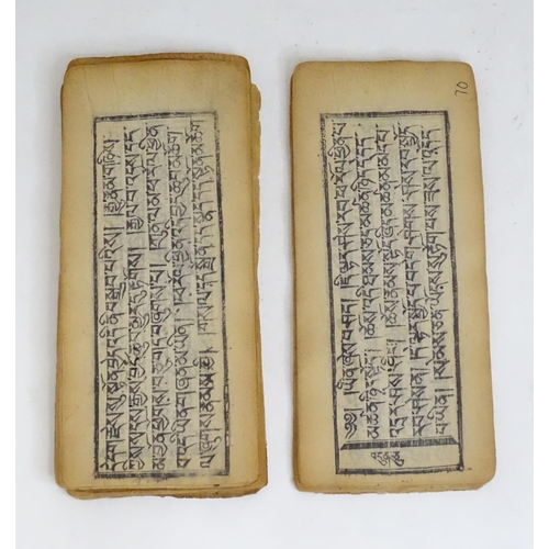 465 - A quantity of parchment leaves of a religious text, having block printed script and some illustratio... 