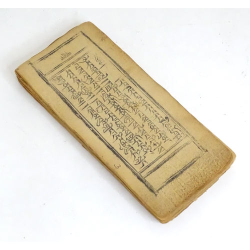 465 - A quantity of parchment leaves of a religious text, having block printed script and some illustratio... 