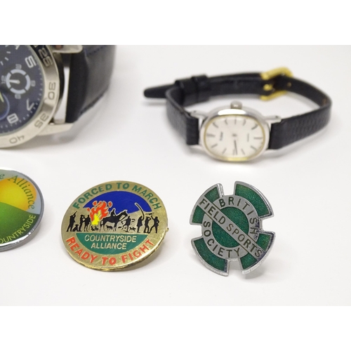 470 - Three various wrist watches with quartz movements. Together with Countryside Alliance badges, etc. (... 