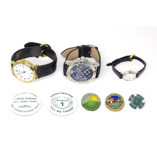 470 - Three various wrist watches with quartz movements. Together with Countryside Alliance badges, etc. (... 