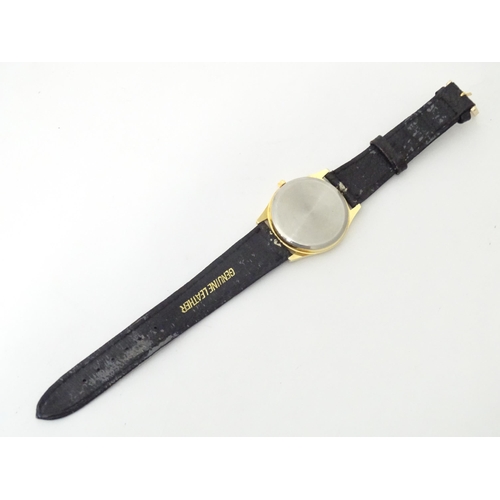 471 - A gentleman's wristwatch with Japanese movement and leather strap. The case approx 1 1/4