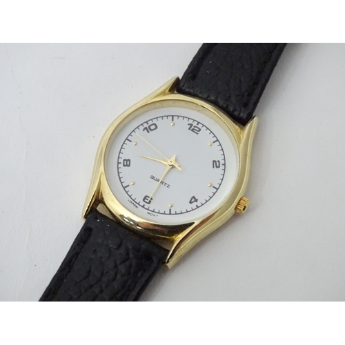 471 - A gentleman's wristwatch with Japanese movement and leather strap. The case approx 1 1/4