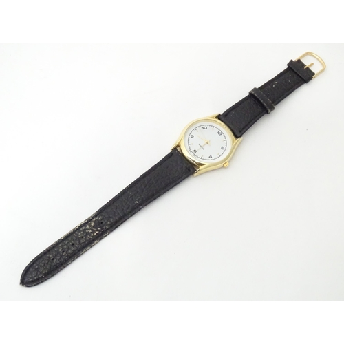 471 - A gentleman's wristwatch with Japanese movement and leather strap. The case approx 1 1/4