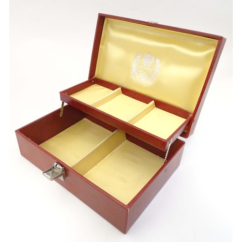 483 - A Queen's silver jubilee 1977 jewellery box containing a rolled gold bangle with engraved decoration... 