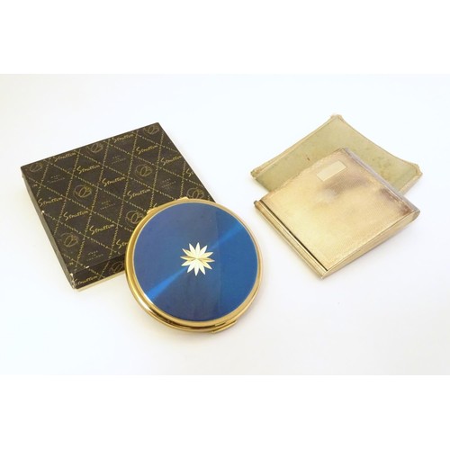 491 - A Stratton powder compact with blue and gilt finish with a Stratton box, approx 3 1/4