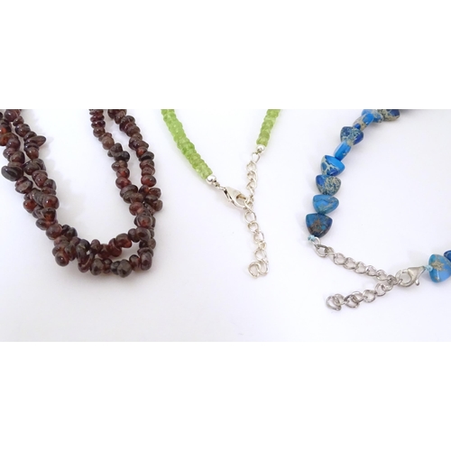 492 - Three various bead necklaces to include one of turquoise coloured beads, another of garnet coloured ... 