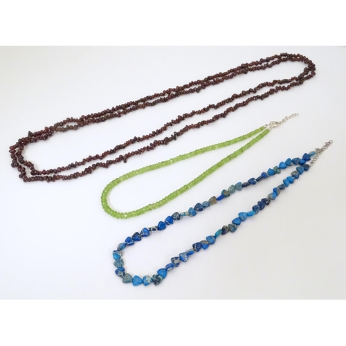 492 - Three various bead necklaces to include one of turquoise coloured beads, another of garnet coloured ... 