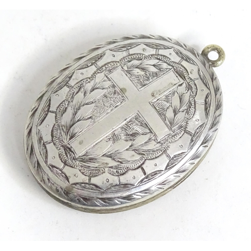 510 - A white metal pendant locket