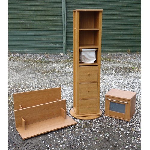 567 - Items of modern bedroom furniture, comprising a revolving mirrored unit with shelves and drawers on ... 