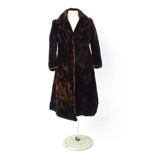 664 - Vintage fashion / clothing: A vintage, long length fur coat, chest measures 34