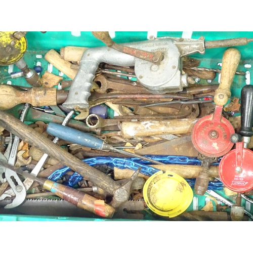 672 - A quantity of 20thC hand tools, including drills, hammer, saw, gardening implements, scales etc.