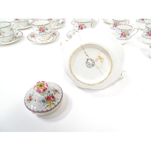 137 - A quantity of Royal Albert tea wares in the Petit Point pattern to include teapot, cups, saucers, si... 