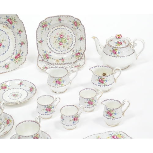 137 - A quantity of Royal Albert tea wares in the Petit Point pattern to include teapot, cups, saucers, si... 