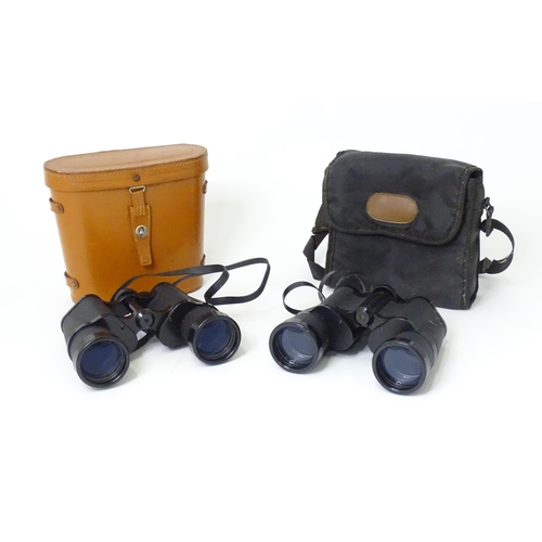 174 - Two pairs of 20thC binoculars, comprising a Zenith 10x50 pair in a pigskin case, and a Halina Crown ... 