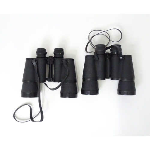 174 - Two pairs of 20thC binoculars, comprising a Zenith 10x50 pair in a pigskin case, and a Halina Crown ... 