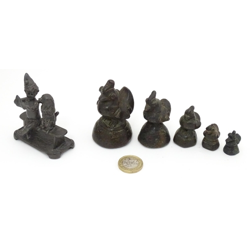 461 - Five Asian graduated bronze opium weights of stylised bird form. Together with a cast model of a chi... 