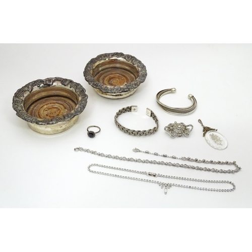 475 - Assorted white metal and silver jewellery together with two small silver plate bottle coasters, each... 