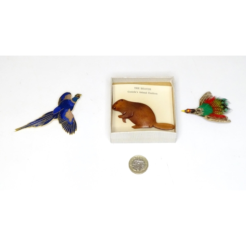 476 - Three vintage brooches comprising one formed as a pheasant with enamel decoration, one of feather fo... 