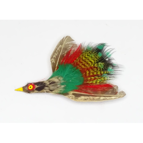 476 - Three vintage brooches comprising one formed as a pheasant with enamel decoration, one of feather fo... 