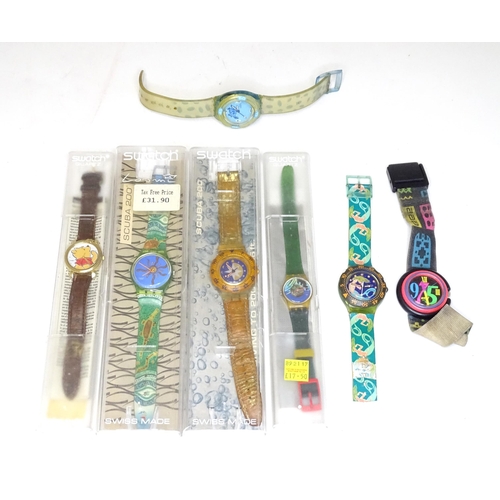 482 - Wristwatches : A quantity of assorted Swatch watches, together with an example by Minitz, etc.