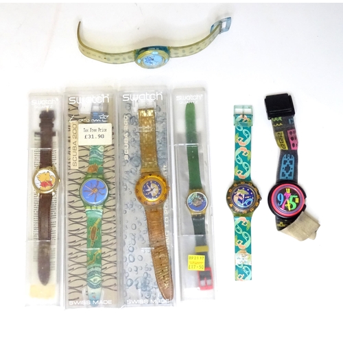 482 - Wristwatches : A quantity of assorted Swatch watches, together with an example by Minitz, etc.