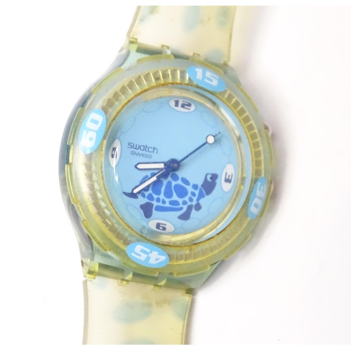 482 - Wristwatches : A quantity of assorted Swatch watches, together with an example by Minitz, etc.