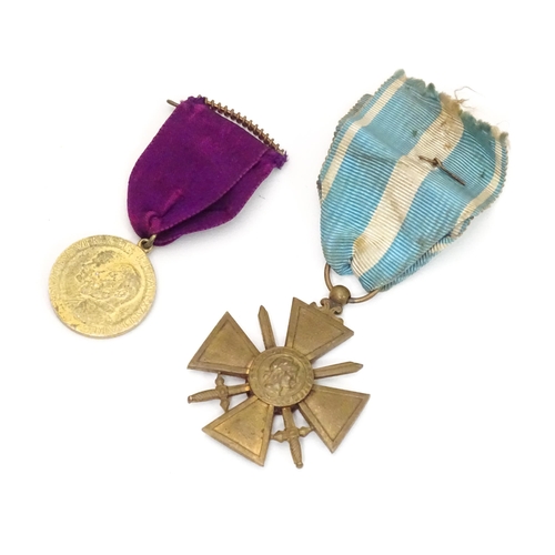 495 - Militaria: a WWII / World War 2 / WW2 / Second World War French Croix de Guerre medal, with colonial... 