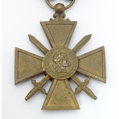 495 - Militaria: a WWII / World War 2 / WW2 / Second World War French Croix de Guerre medal, with colonial... 