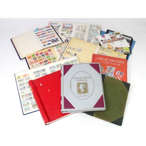 547 - Eleven stamp albums, containing 19thC and later British, colonial and worldwide stamps. Including th... 