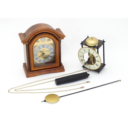 558 - A mantel clock by Bentima with Westminster chimes. Together with another clock marked Made in German... 