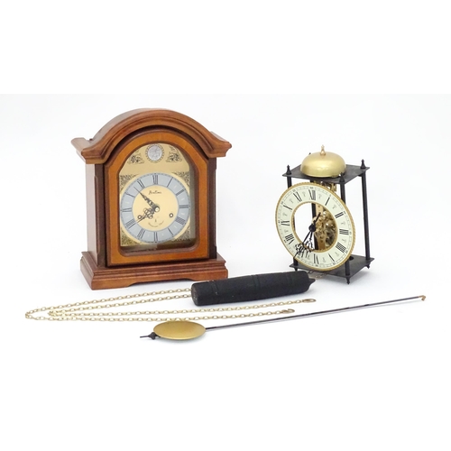 558 - A mantel clock by Bentima with Westminster chimes. Together with another clock marked Made in German... 