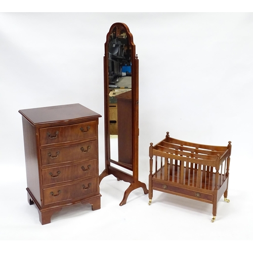 566 - A collection of furniture to include, cheval mirror, Canterbury and a serpentine shaped bedside cabi... 