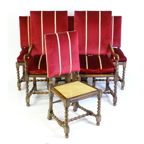 820 - A set of six 20thC oak dining chairs with barley twist supports and caned seats. 22