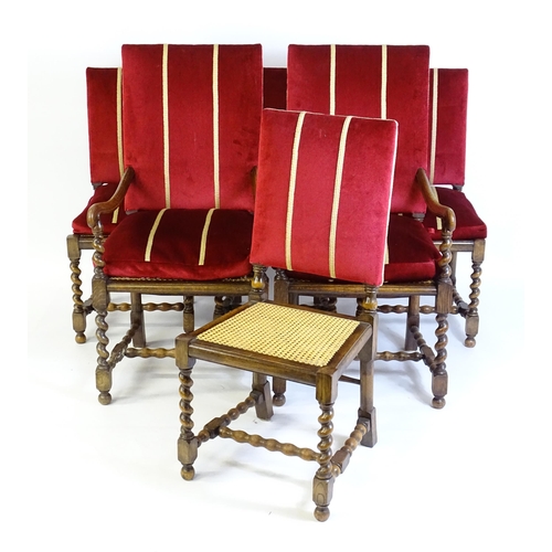 820 - A set of six 20thC oak dining chairs with barley twist supports and caned seats. 22