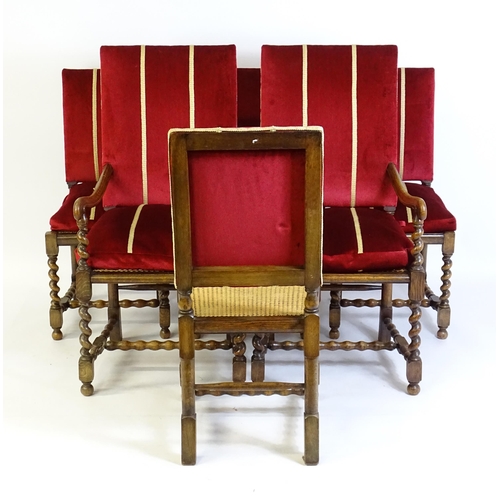 820 - A set of six 20thC oak dining chairs with barley twist supports and caned seats. 22