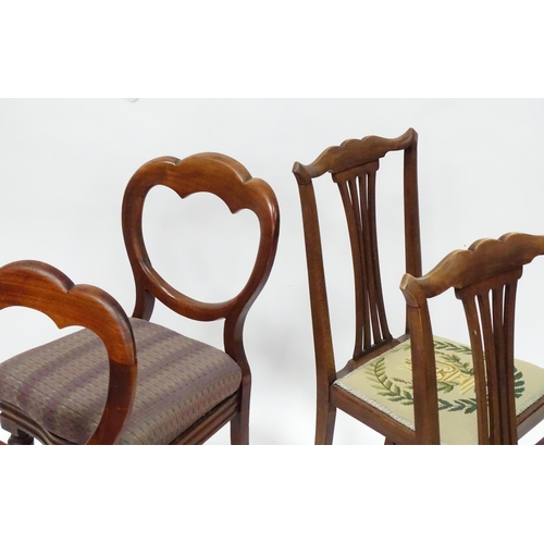 824 - A pair of Victorian mahogany dining chairs with balloon backs, together with a pair of Edwardian sid... 