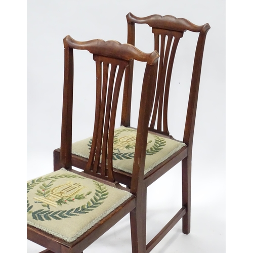 824 - A pair of Victorian mahogany dining chairs with balloon backs, together with a pair of Edwardian sid... 