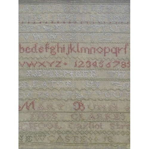 518 - A Victorian sampler with alphabet and verse by Mary Bunn. Ascribed verso with portrait. Approx. 11