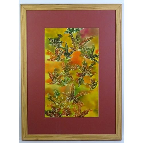 821 - A 20thC batik picture depicting leaves. Approx. 18 3/4