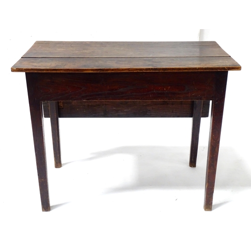 839 - A Georgian elm table with gate leg supporting a single leaf, the top approx 35