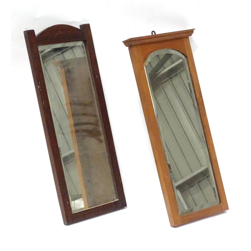 840 - Two early 20thC mirrors, each of oblong form with hardwood frames and bevelled glass, measuring appr... 