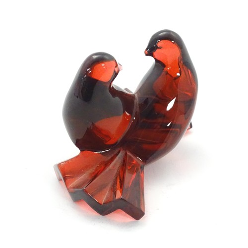 227 - Baccarat Crystal : A red glass model of two love birds / doves. Marked under. Approx 2 1/2