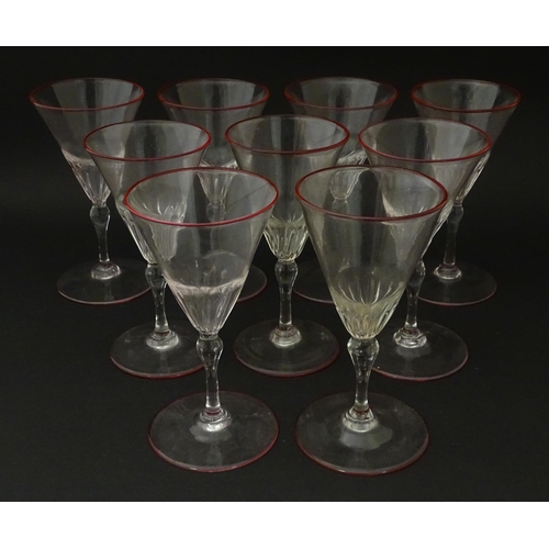 247 - Salviati & Co. Glassware: Nine Venetian glass pedestal drinking glasses with pink detail to rims. Ap... 